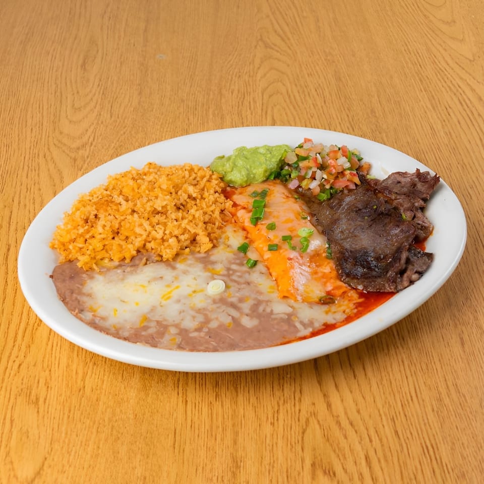 A plate of Mexican food with rice, refried beans, enchilada, grilled meat, guacamole, and pico de gallo.